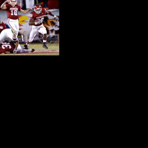 Adrian Peterson Oklahoma Sooners Fanatics Authentic Unsigned Crimson Jersey  Scoring Touchdown vs. Kansas State Photograph