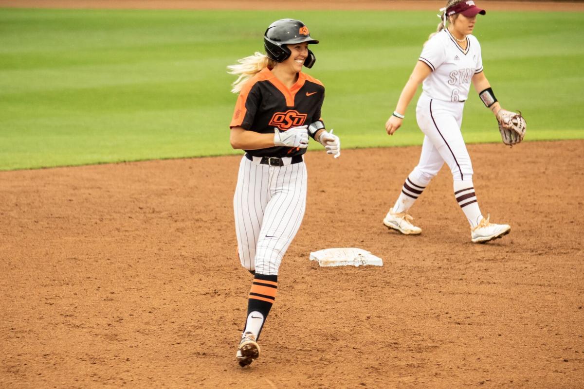Guerin Emig A Little Rain Can T Stop The Party At Cowgirl Stadium As Osu Advances To Super Regionals Osu Sports Extra Tulsaworld Com