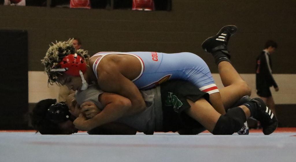High School Wrestling Collinsville Tops Bishop Kelley To