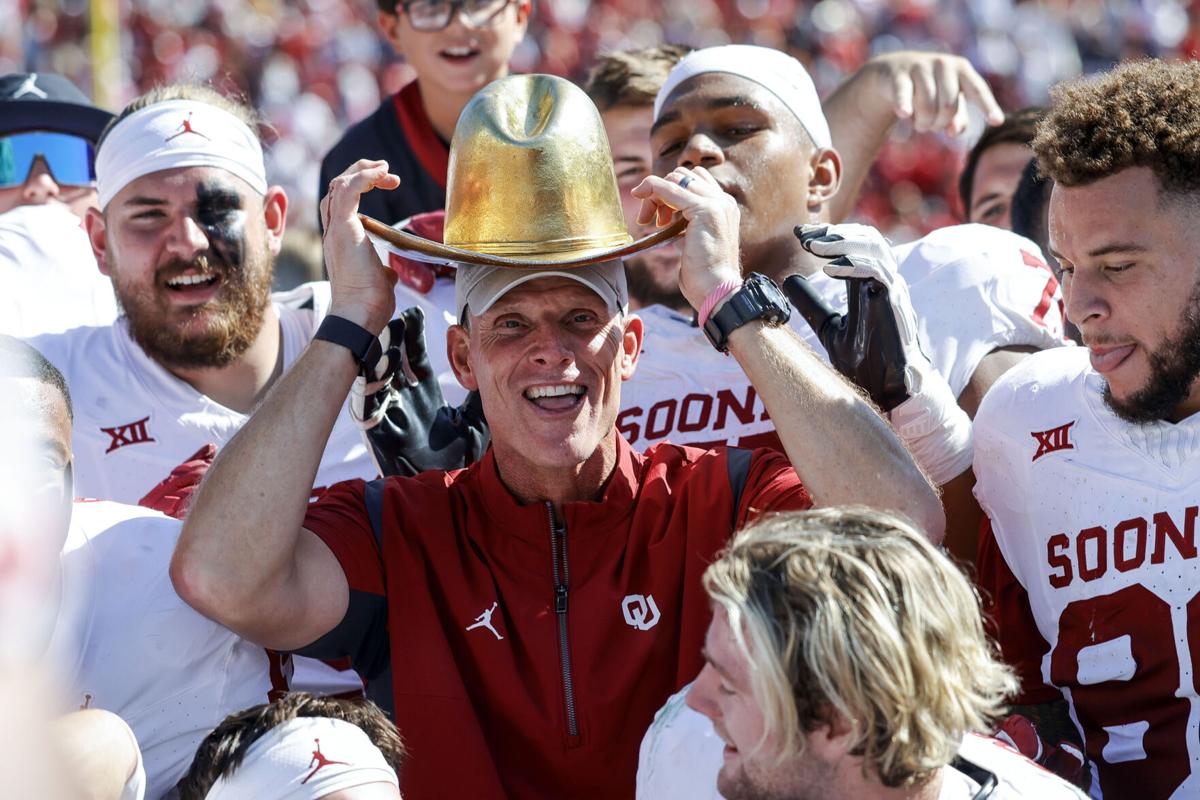 OU custom shoes complete with 'Horns Down' logo, ahead of Red River  Showdown