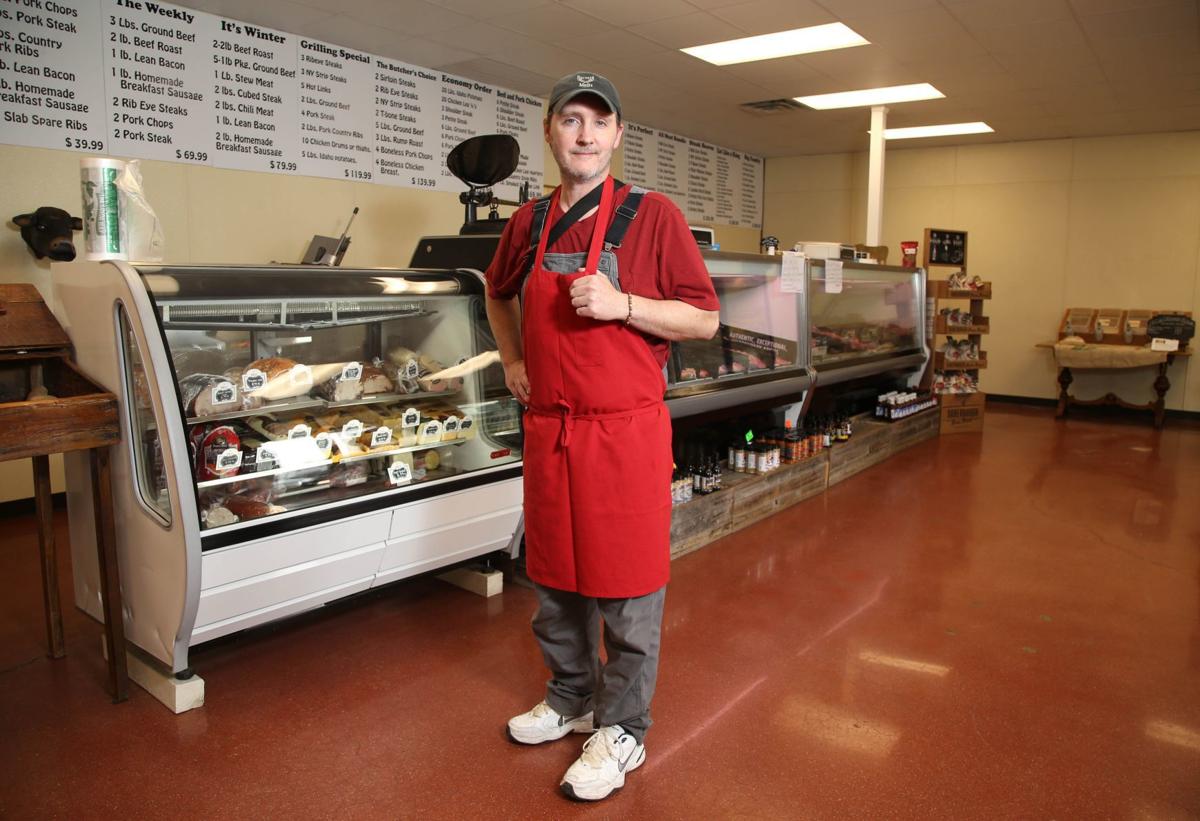 Look for the helpers Harvard Meats owner Duke Dinsmore helps others