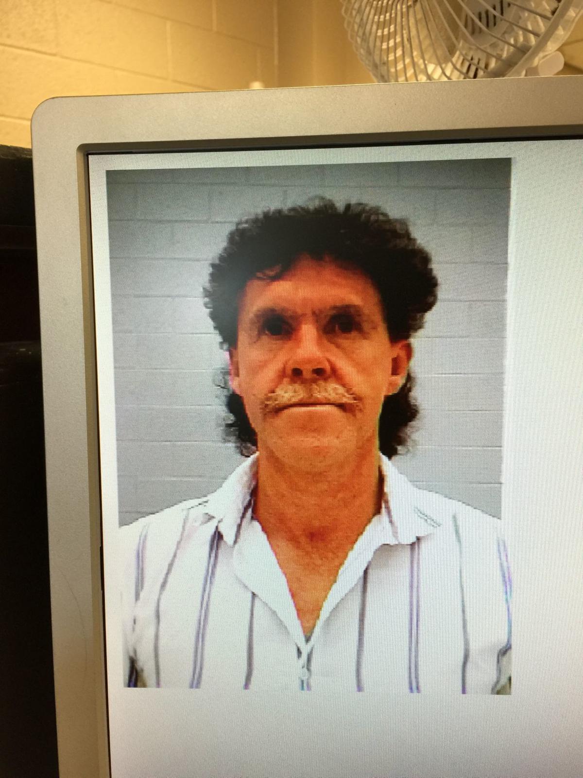 Who are the suspects in the cold case murders of Lauria