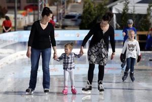 Ice skaters take advantage of warm weather on opening day of Arvest Winterfest