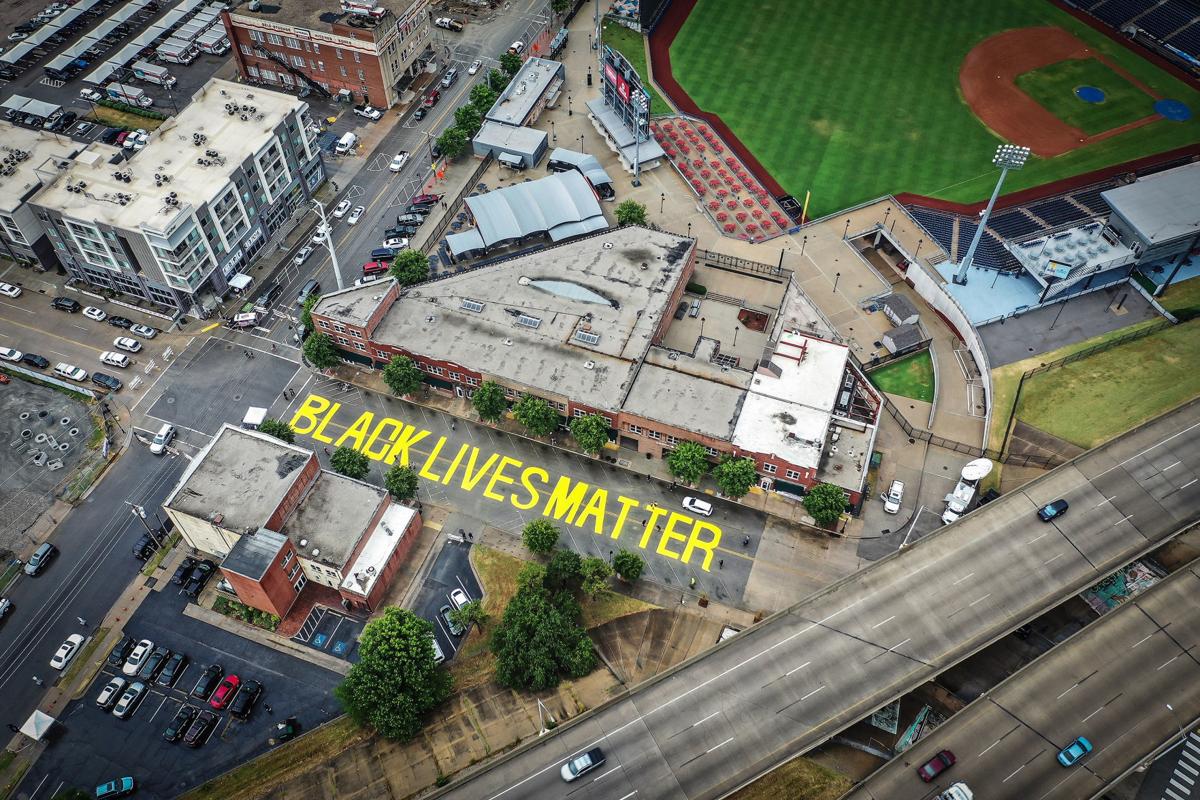Black Wall Street Memorial covered to protect against presidential