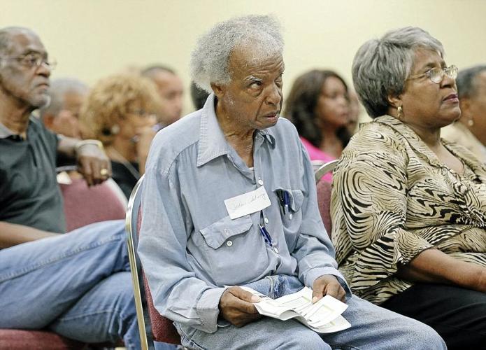 Strong interest, long delays mark uneven start for Affordable Care Act enrollment