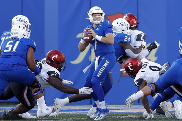 Cincinnati opens AAC defense with 31-21 win over Tulsa