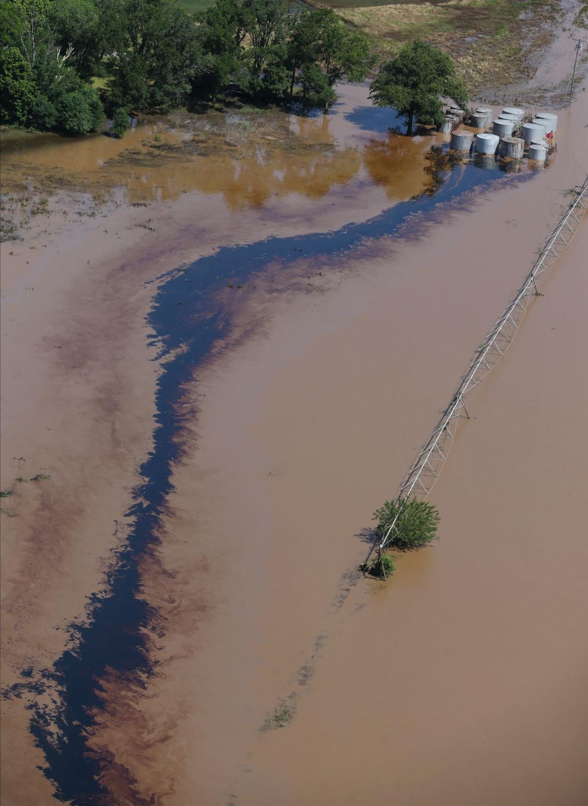 Oil spill amid flooding results in contempt filing from Oklahoma