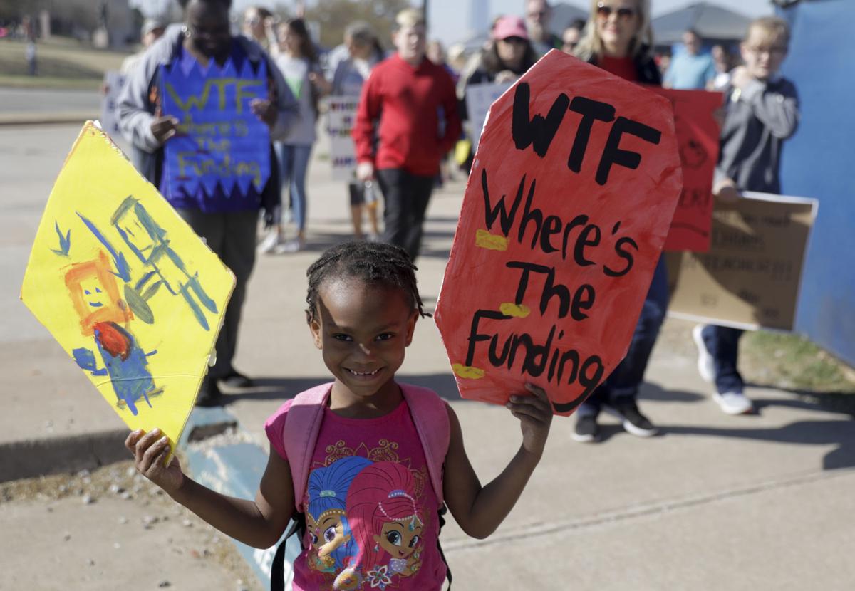 Updated Read the signs teachers are holding for the teacher walkout