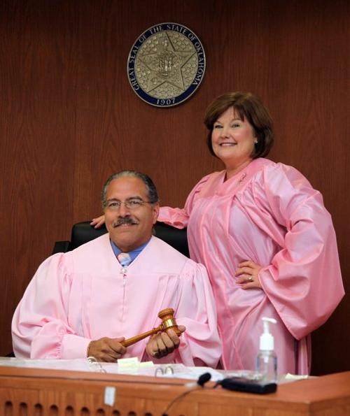 Some judges don pink robes in support of breast cancer awareness