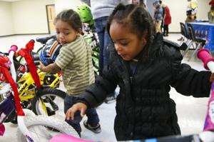 Camp Hope kids get free bicycles during winter reunion