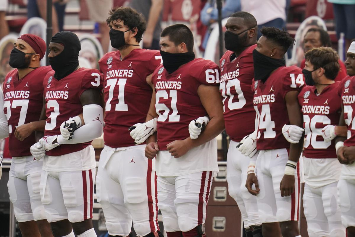 Guerin Emig College Football Players Lock Arms Fans Who See Them As Human Beings Applaud And Hope Rises Ou Sports Extra Tulsaworld Com guerin emig college football players