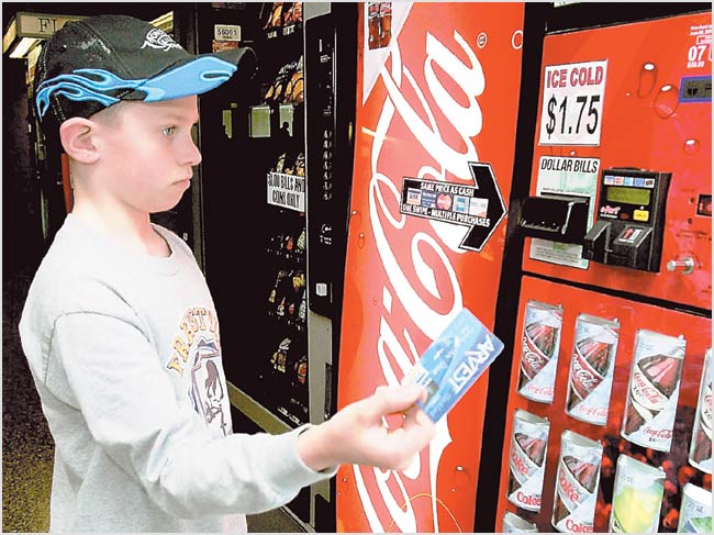 Coke machines accept plastic