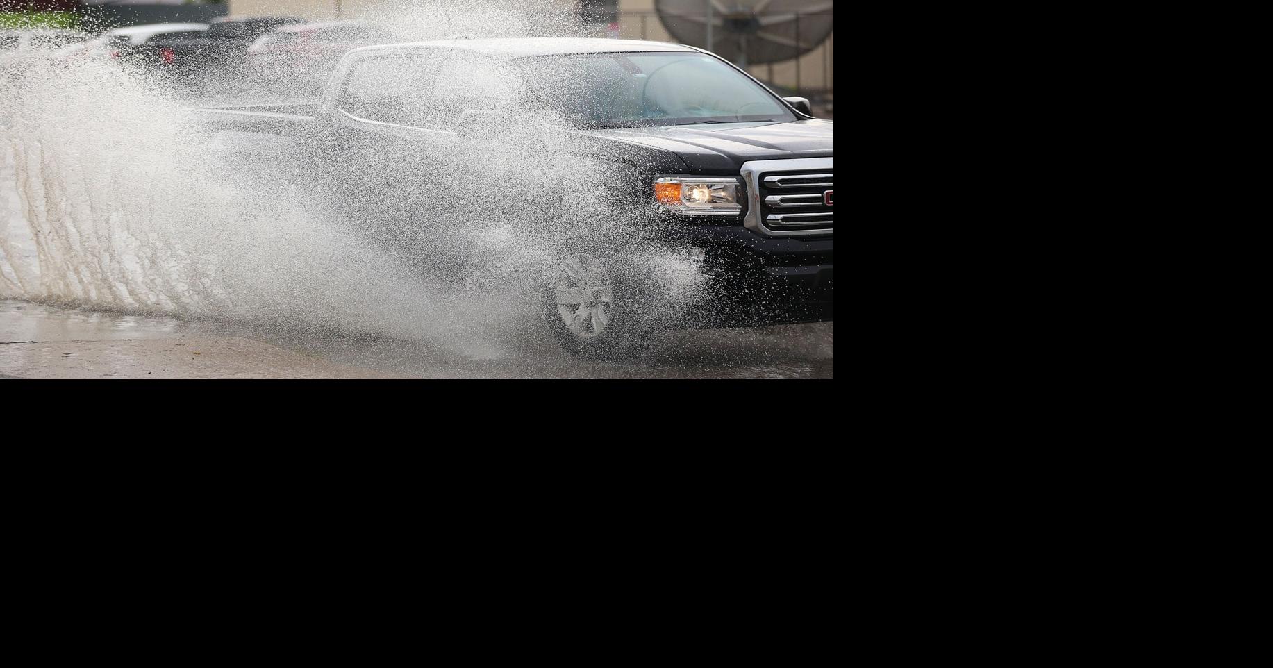 Rain comes with cold front to bring temporary relief from heat