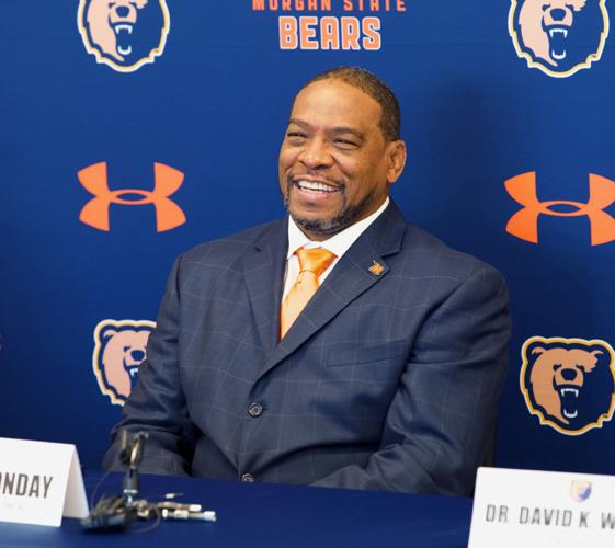 Kenny Monday smiles during his introductory news conference