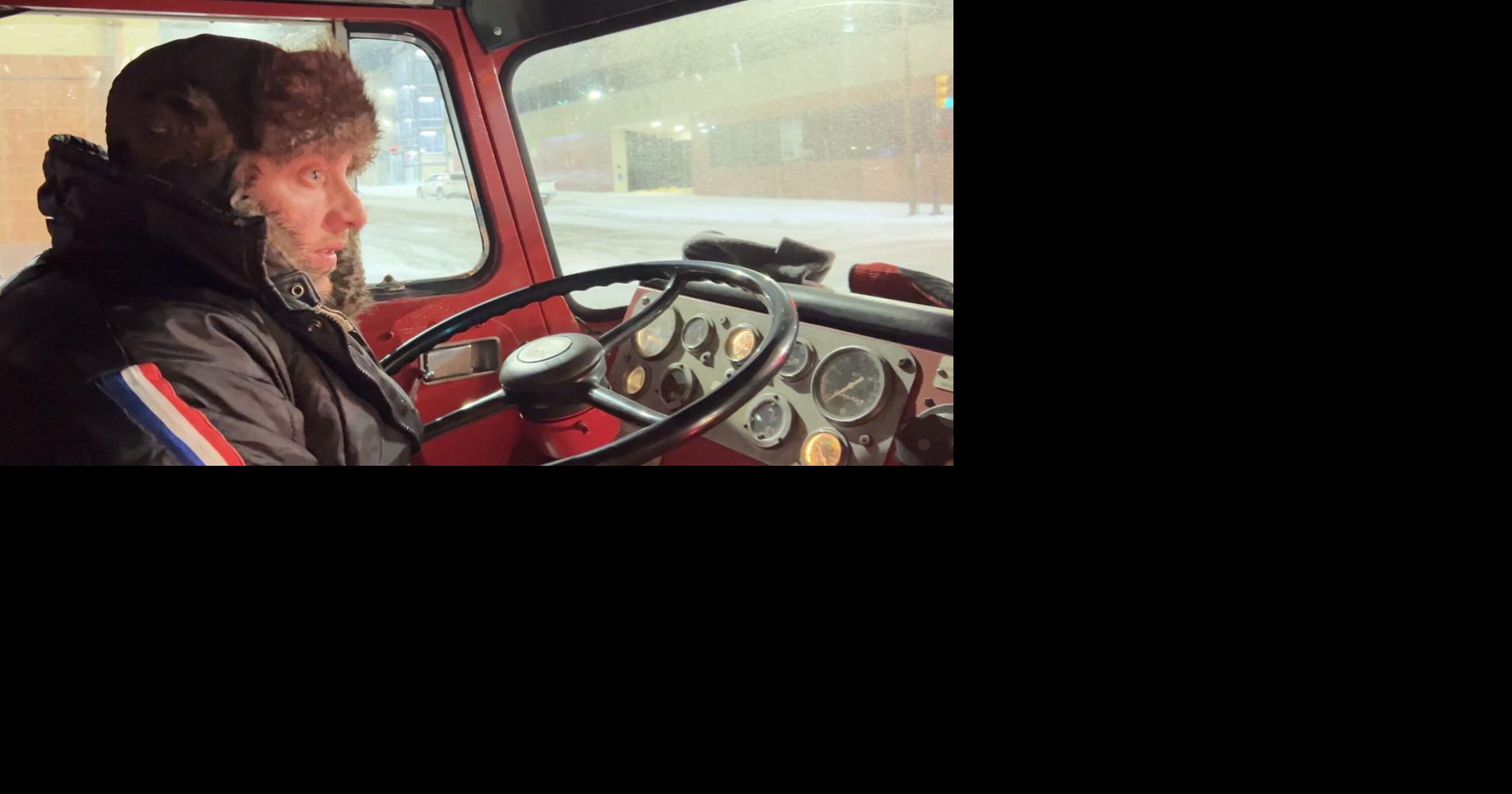Hope in fire engine red: Local man uses ladder truck to lift up lost souls in winter storm