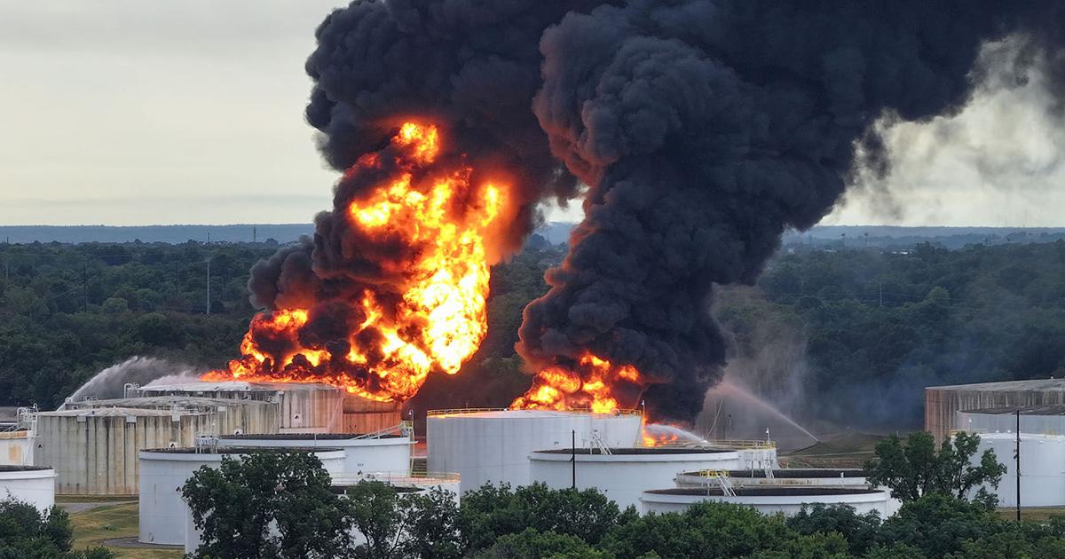 Two views of the fire at Explorer Pipeline in Glenpool