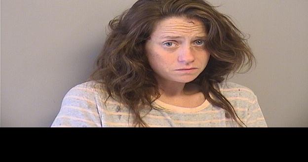 Police: Woman arrested after breaking into home with family inside
