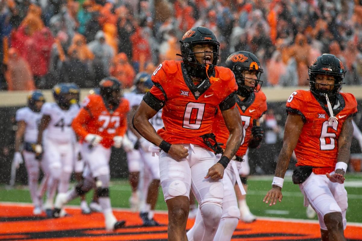 Gordon guides Oklahoma State to fifth straight win in Morgantown