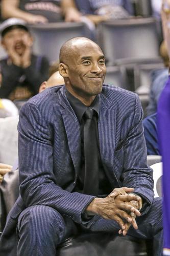 Kobe Bryant dons casual all-Nike outfit while carrying 18-month