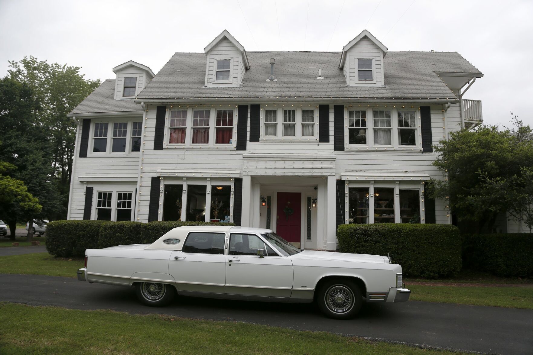 Roy Clark vehicle among items at estate sale being staged to