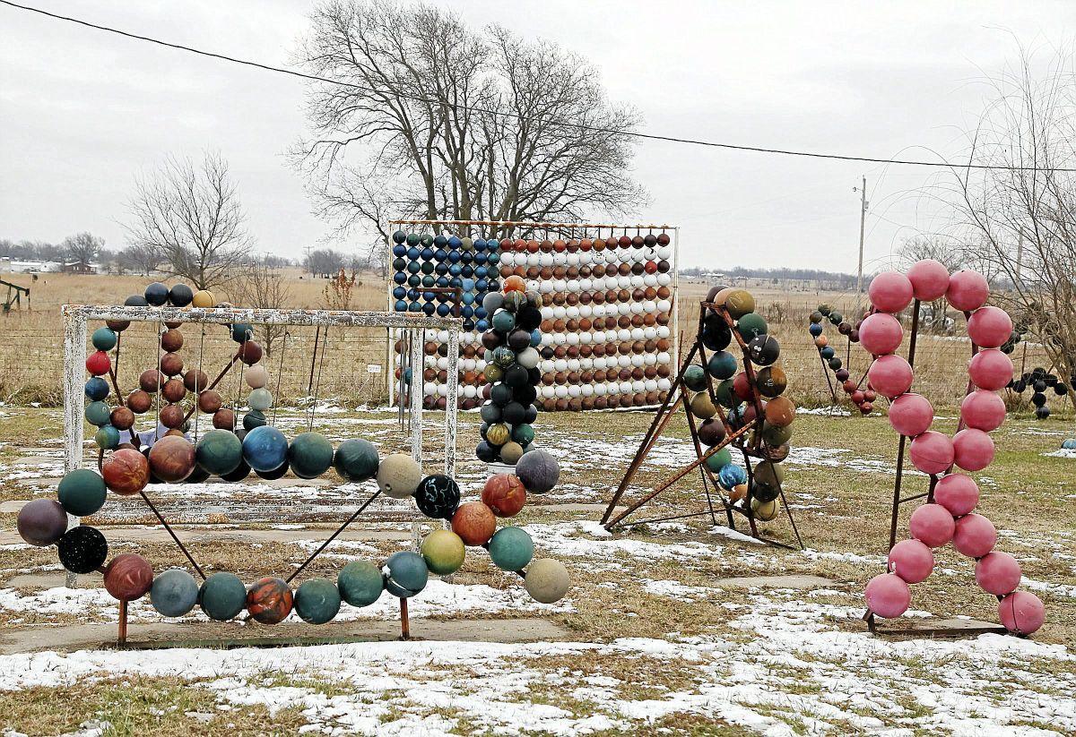 Striking up conversation Bowling balls turn yard into Nowata tourist stop Weekend