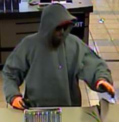 Police seek man who robbed business near 4300 S. Garnett Road