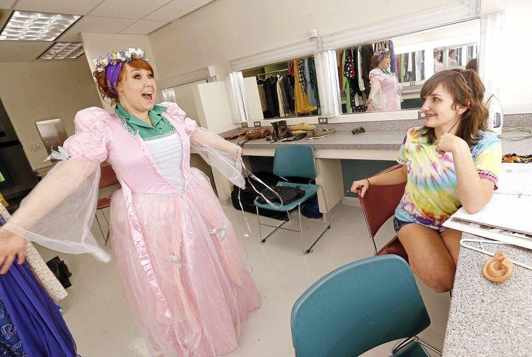 Theatre Tulsa costume designer works with teen apprentice