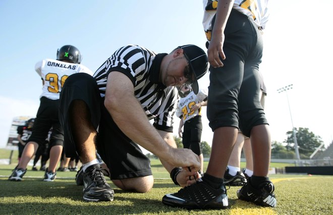 High school football officials have varied backgrounds, share love of ...