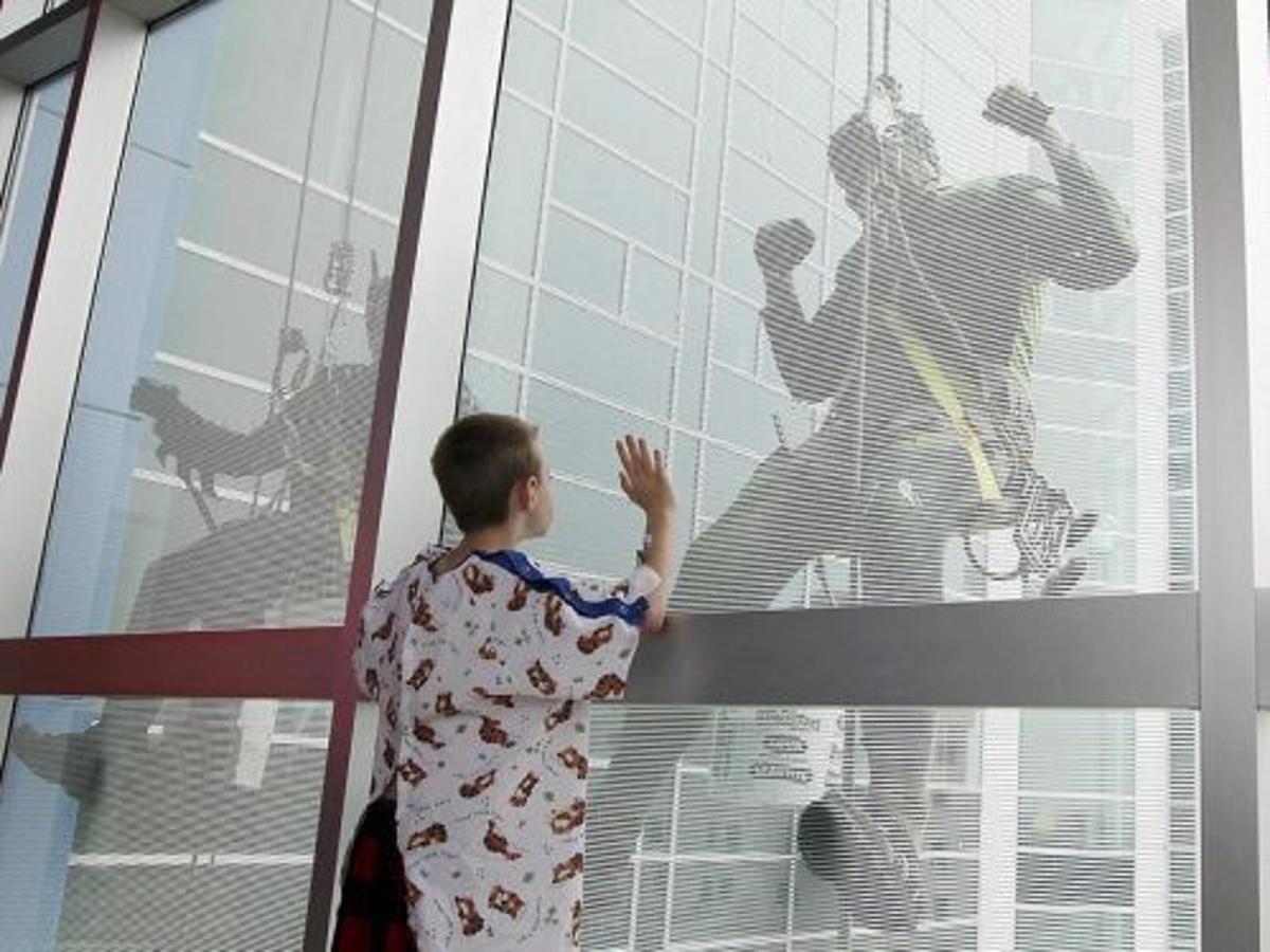 Superheroes Do Windows At Children S Hospital At Saint Francis Local News Tulsaworld Com