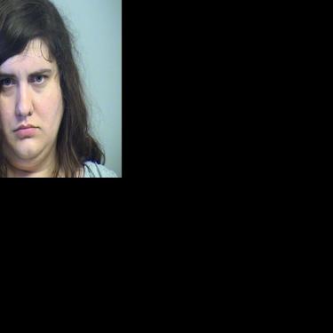 Woman accused of trying to run over boyfriend in QuikTrip parking lot