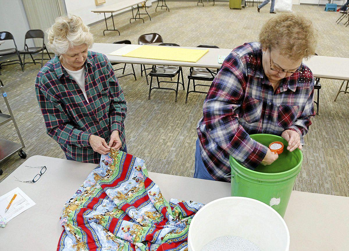 Krazy Stitchers group makes weighted blankets for kids with autism