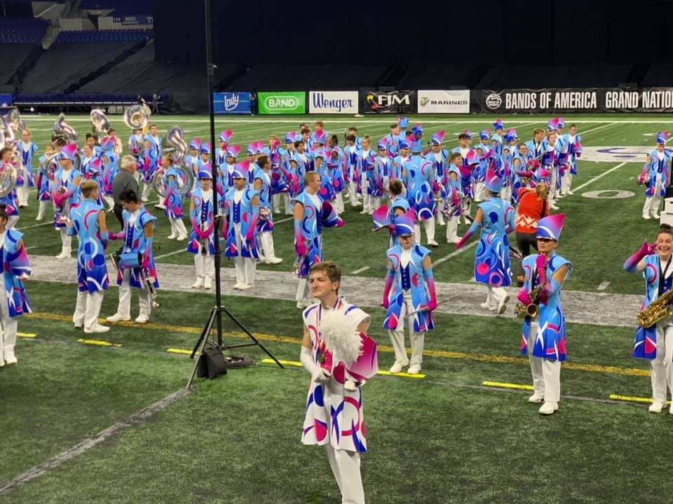 Color guard adds 'visual attribute' to marching band – The Red Ledger