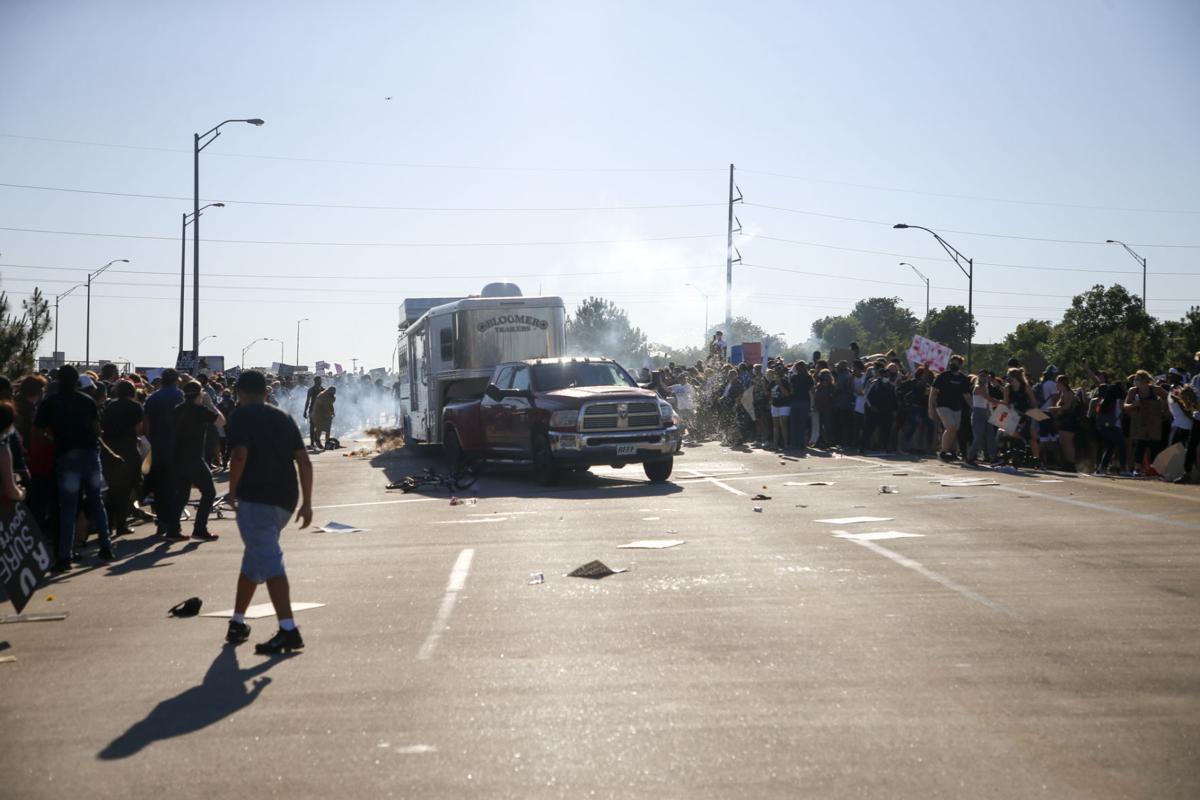Pickup Rolls Through Protesters Gathered On Interstate 244 State Troopers Questioning Driver Local News Tulsaworld Com Pickup Rolls Through Protesters Gathered On Interstate 244 State Troopers Questioning Driver Local News Tulsaworld Com
