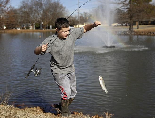 T-shirts, shorts and trout: Holiday fishing 'hot' at local stocked pond  (copy)