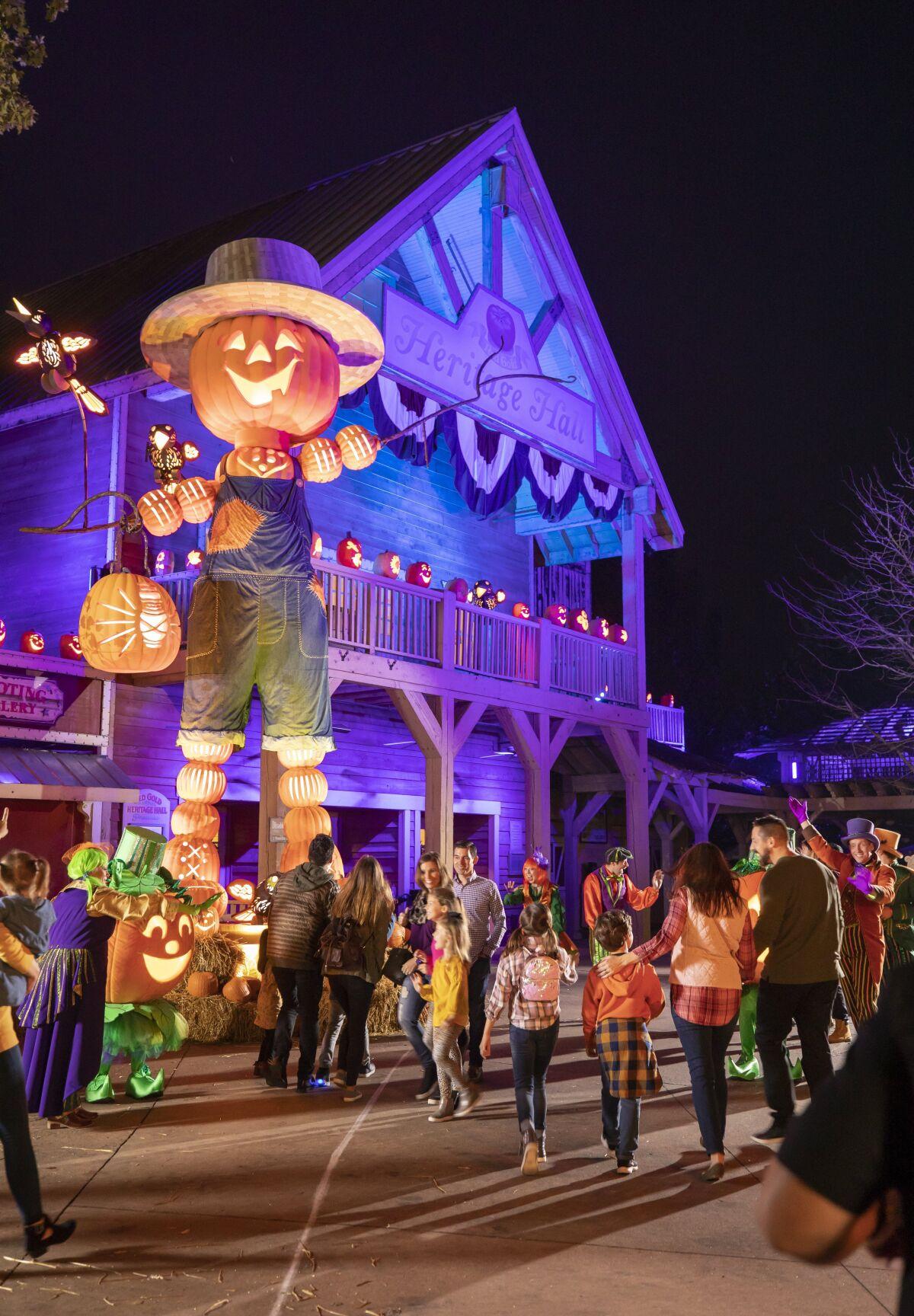 19. Pumpkin Greeter with Crowd