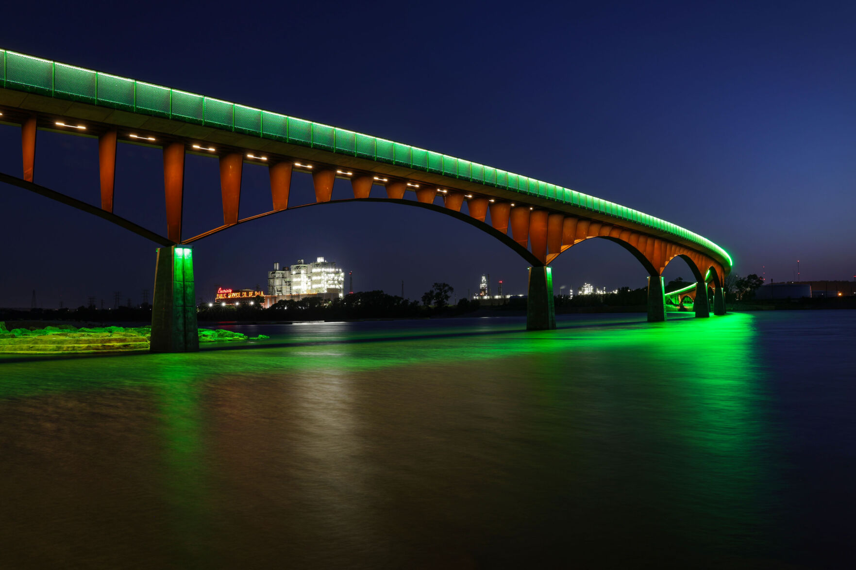 Pedestrian bridge's new lights brighten Arkansas River