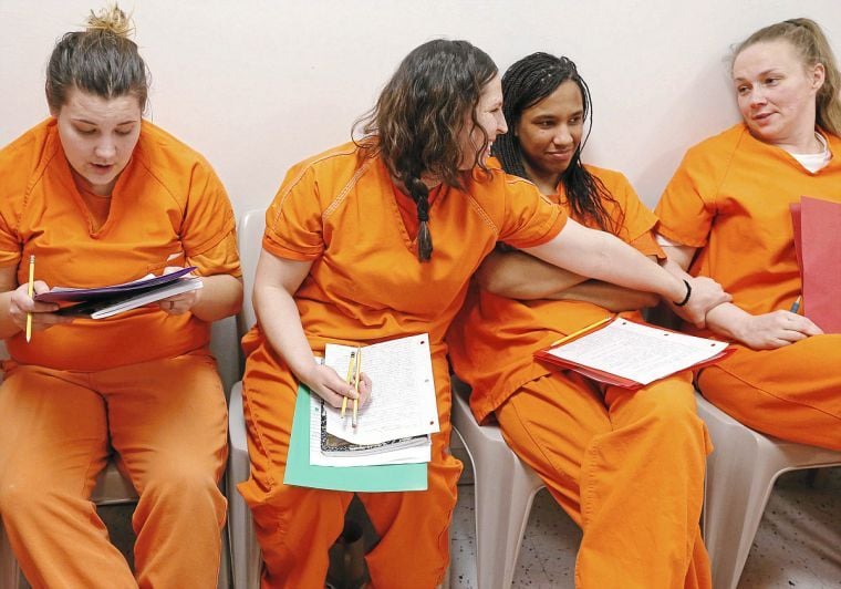 Female inmates at the Tulsa jail take part in a Poetic Justice program