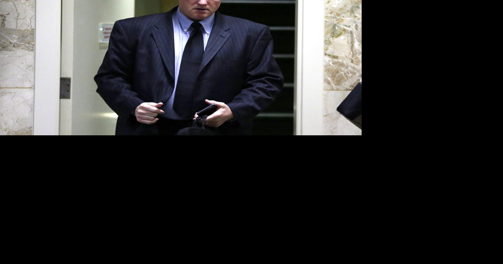 Detective grilled over wrongful release of evidence at former officer's ...