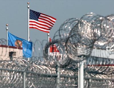 holdenville prison correctional facility davis private corrections investigating homicide potential department tulsaworld inmate perimeter razor surrounds entrance wire run near