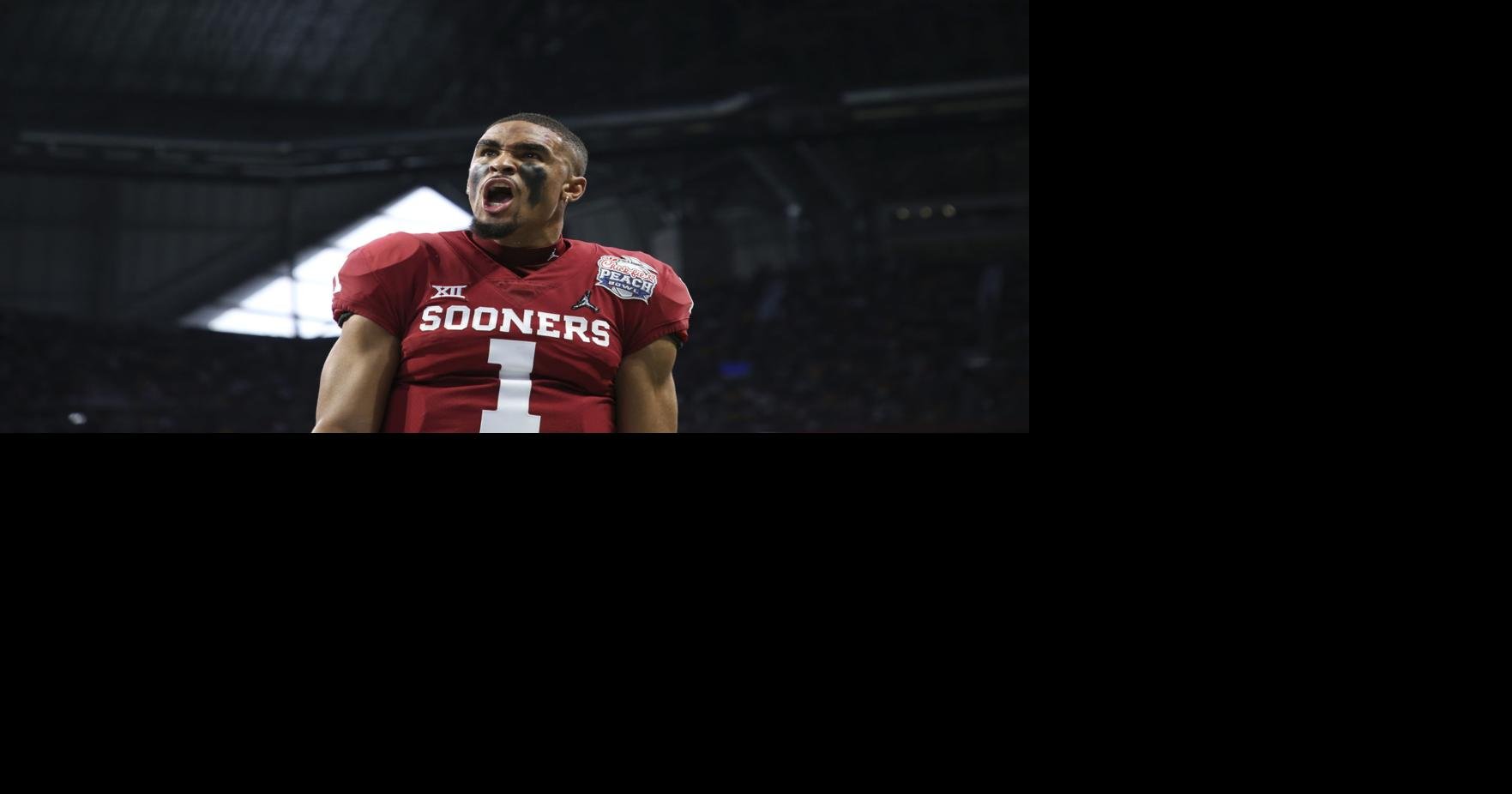 Oklahoma quarterback Baker Mayfield catches a pass from wide receiver  CeeDee Lamb for a touchdown against Georgia during the first half of the  Rose Bowl NCAA college football game, Monday, Jan. 1