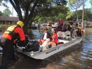 Oklahoma crews busy conducting rescues, evacuations in flooded Houston