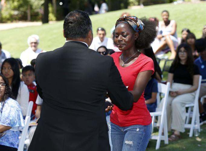 070122-tul-nws-naturalize-p4