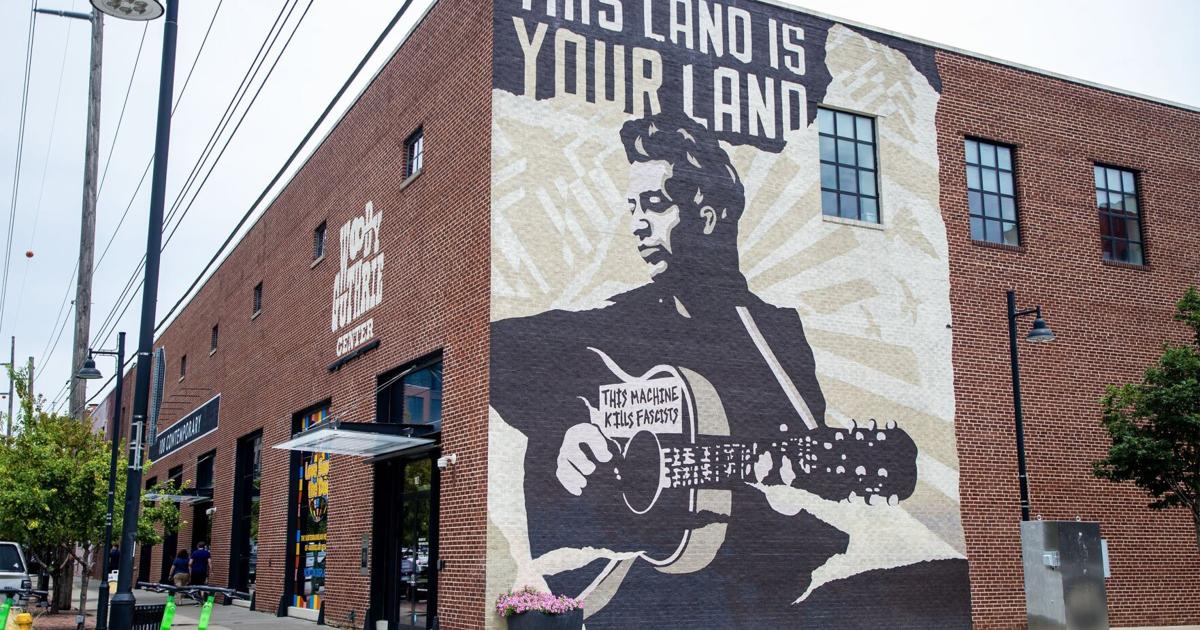 Legendary folk singer's legacy celebrated in Woody Guthrie Center's ...
