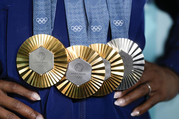 US beats China in final Olympic medals count, tie for gold