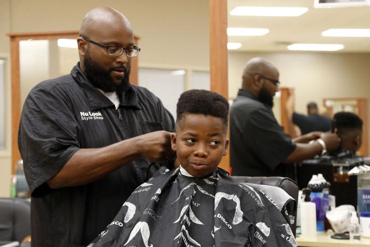 Hundreds of kids get free back-to-school haircuts at Tulsa Tech