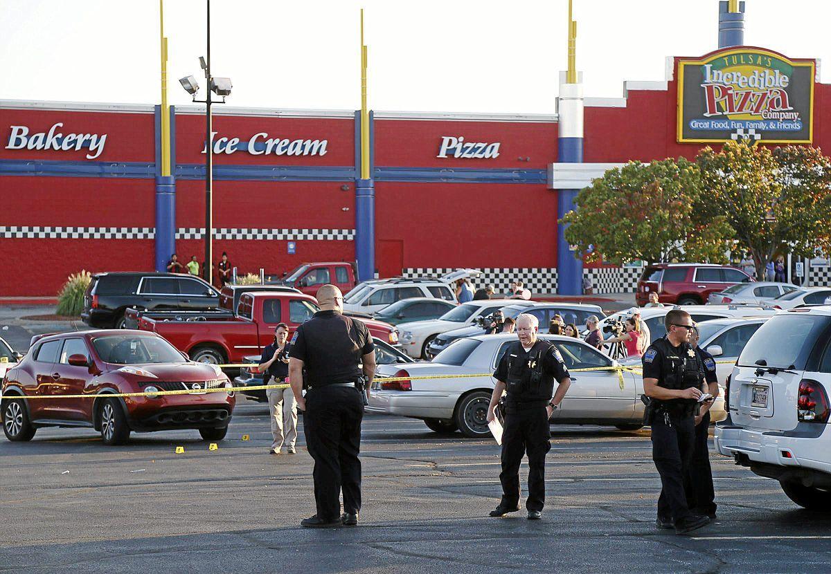 Police investigate reports of shots fired outside pizza restaurant; no