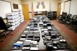 Crime ringleaders are using cellphones in prison. Officials know it, but no one is stopping it.