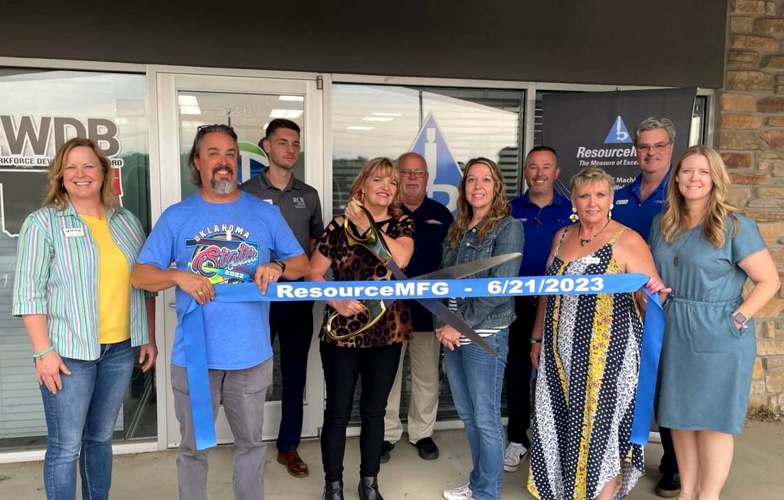 ResourceMFG, specializing in manufacturing staffing, cuts ribbon with