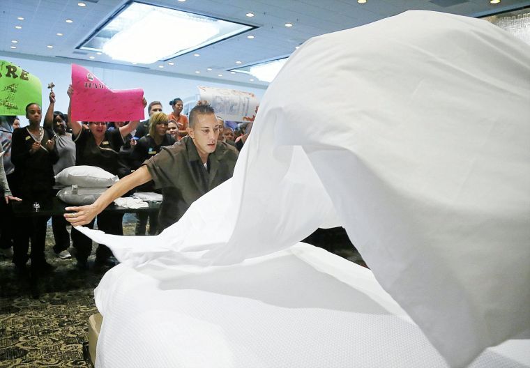 Area hotel employees compete in bedmaking contest
