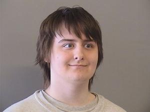 Robert Bever breaks down in tears on the witness stand in his younger brother's murder trial